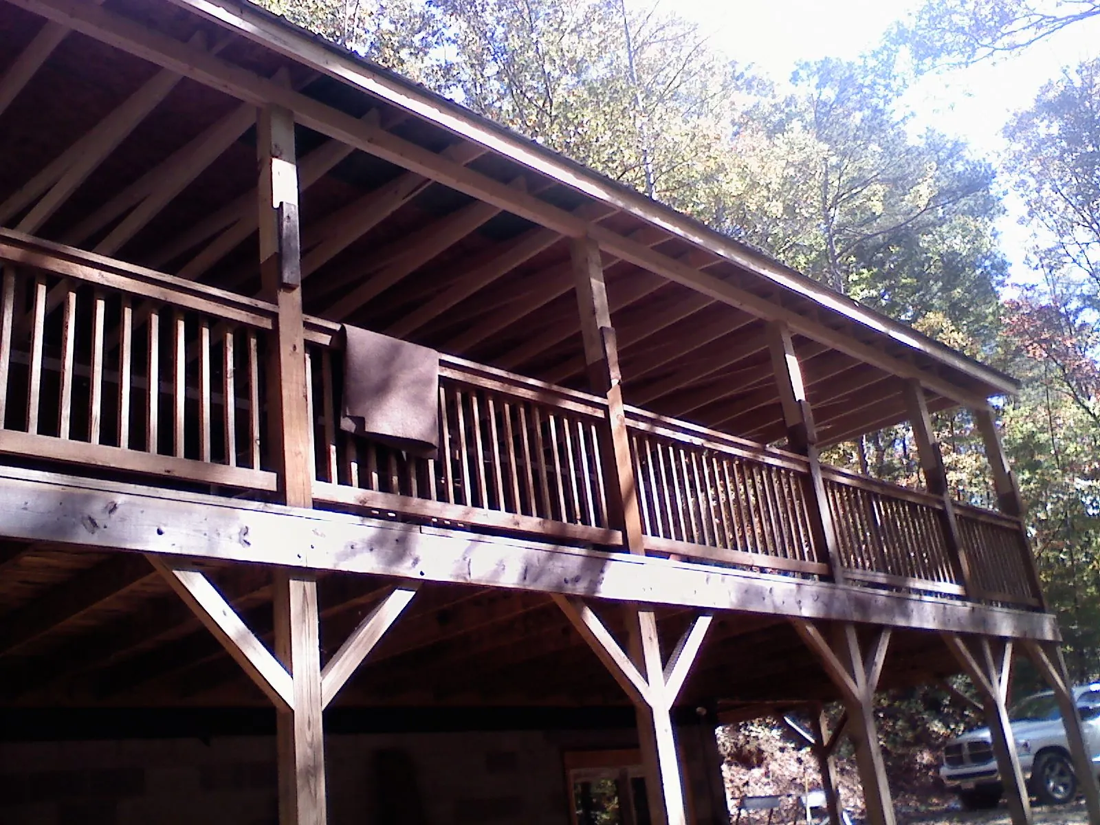 Timber framing under a new elevated porch and deck — Roof Leak Repair in Minneapolis by Roofing Brothers